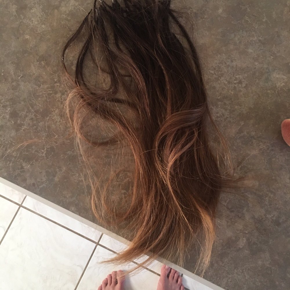 Hair extensions that fell out within two weeks.