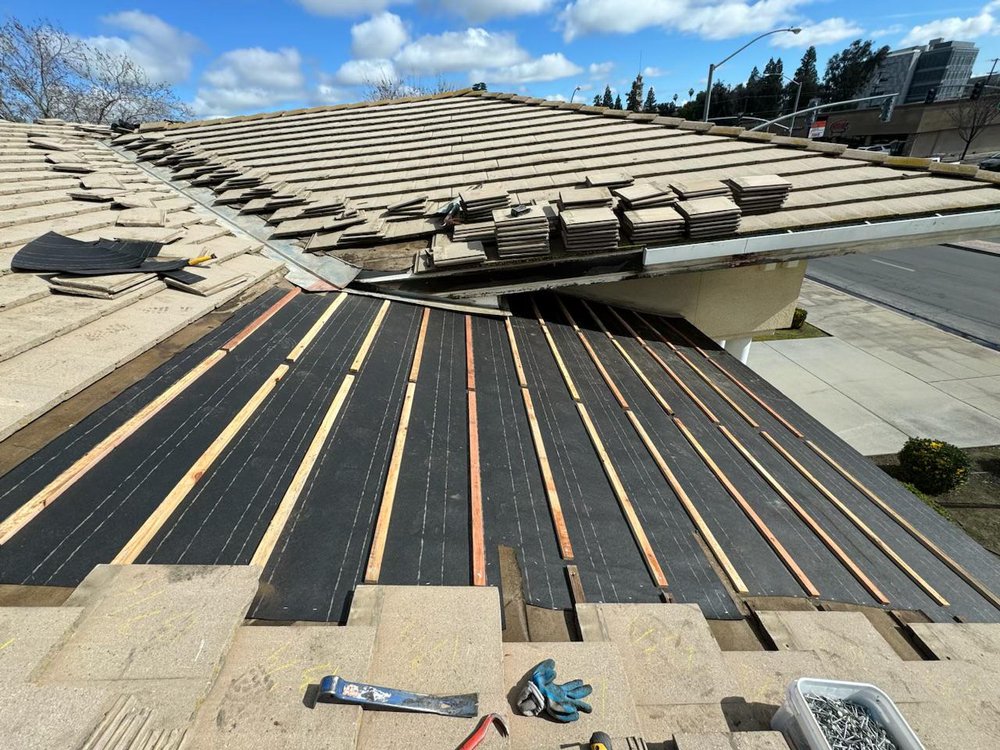 Slide of TAAG Roofing