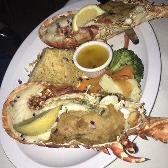 Mim's Seaside Bistro - Small baked stuff lobster - Seafood Near Me - St Thomas, Virgin Islands Mim's Seaside Bistro - Small baked stuff lobster - Seafood Near Me - St Thomas, Virgin Islands