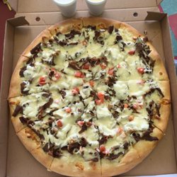 Valley Pizza Restaurant - Pour the Donair sauce on the pizza (or dip if you choose).   It'll be messy and yummy
