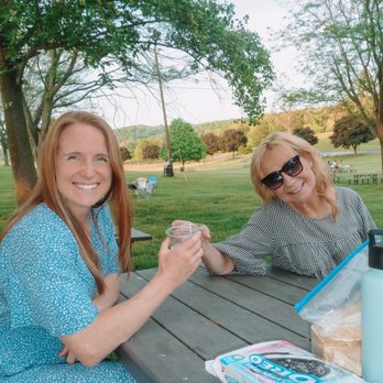 Linganore Winecellars - Enjoying a bottle, snacks, and live music on the lawn - Venues & Event Spaces Near Me - Mount Airy, Maryland