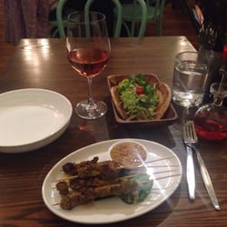 Madam Woo - Dinner!  Actually two appetizers.  Lamb Satay and a chicken hawkers roll.  Dry New Zealand rose wine.