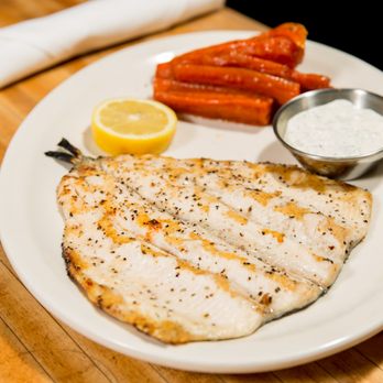 The White Chocolate Grill - a plate of fish and carrots - American Near Me - Lone Tree, Colorado The White Chocolate Grill - a plate of fish and carrots - American Near Me - Lone Tree, Colorado