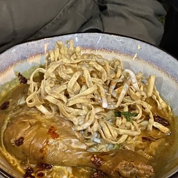 Temsib Eatery & Bar - Half chicken with coconut curry and crunchy noodles - the table favorite - Thai Near Me - Bellevue, Washington Temsib Eatery & Bar - Half chicken with coconut curry and crunchy noodles - the table favorite - Thai Near Me - Bellevue, Washington