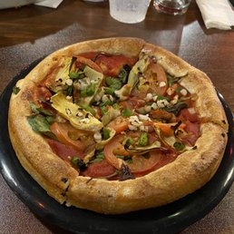 The Hippie Veggie pizza small, garlic instead of black olive The Hippie Veggie pizza small, garlic instead of black olive
