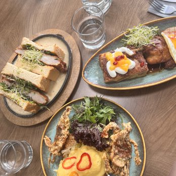 Tur - The spread: Tonkatsu Sandwich Sizzling (left), Duck duck (right), Softie Benedict (bottom) - Breakfast & Brunch Near Me - San Francisco, California