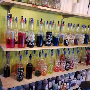 Everything's Sweet - a shelf full of liquor bottles - Shaved Ice Near Me - Carthage, Texas Everything's Sweet - a shelf full of liquor bottles - Shaved Ice Near Me - Carthage, Texas