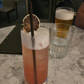 Fog Room - Spirit free beverage and my partner's beer in the background. - Cocktail Bars Near Me - Seattle, Washington