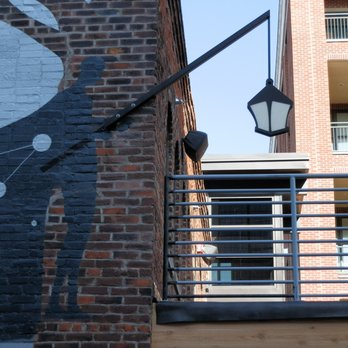The Livery Mural by Olson - mural by Justin Olson 2016 - note the hand painted brick color to restore the look. - Public Art Near Me - Indianapolis, Indiana