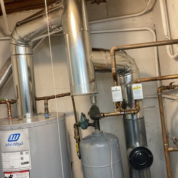 A Sweep Above - Smoke pipe on boiler and hot water heater - Fireplace Services Near Me - Bohemia, New York A Sweep Above - Smoke pipe on boiler and hot water heater - Fireplace Services Near Me - Bohemia, New York