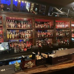 Flute and Dram - The whiskey shelves are stocked with nice selections.