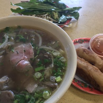 Saigon Deli - A #13 Pho with all the yummy goodness and egg rolls to match it with. - Vietnamese Near Me - Tampa, Florida Saigon Deli - A #13 Pho with all the yummy goodness and egg rolls to match it with. - Vietnamese Near Me - Tampa, Florida