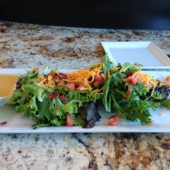 Hotel Indigo Waco - Baylor - dinner stars with a fresh salad - Hotels Near Me - Waco, Texas Hotel Indigo Waco - Baylor - dinner stars with a fresh salad - Hotels Near Me - Waco, Texas