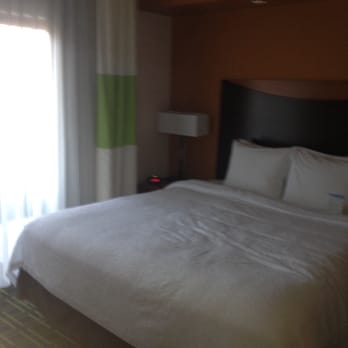 Fairfield by Marriott Inn & Suites Santa Cruz - Capitola - Our king bed and balcony. - Hotels Near Me - Capitola, California Fairfield by Marriott Inn & Suites Santa Cruz - Capitola - Our king bed and balcony. - Hotels Near Me - Capitola, California