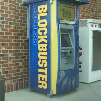 Sheetz - a blue and yellow vending machine in front of a brick building - Convenience Stores Near Me - York, Pennsylvania