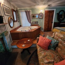 House of 1833 Bed and Breakfast - relaxing settee by your working wood burning fireplace and enormous corner Jacuzzi tub 2023