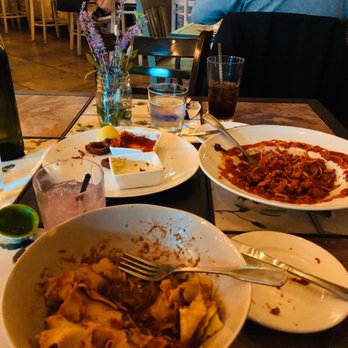 Fiori - Wild Boar Ragu, Spaghetti and Meatballs and empty plate of Calamari - Italian Near Me - Flower Mound, Texas