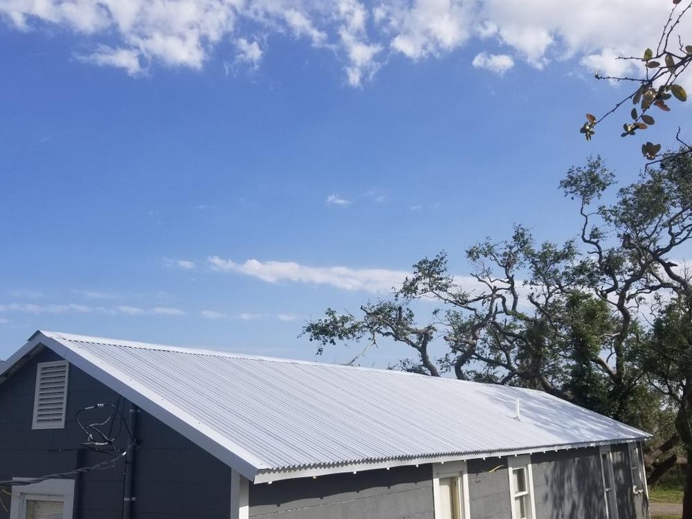 Slide of Vasquez Roofing Company