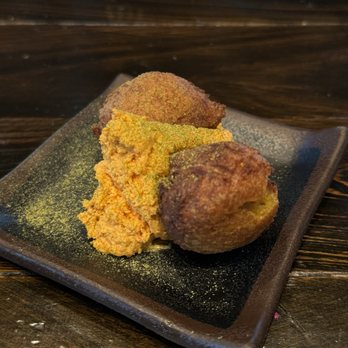 Maypop Restaurant - Curry beignets with Tom yum cream cheese - New American Near Me - New Orleans, Louisiana Maypop Restaurant - Curry beignets with Tom yum cream cheese - New American Near Me - New Orleans, Louisiana