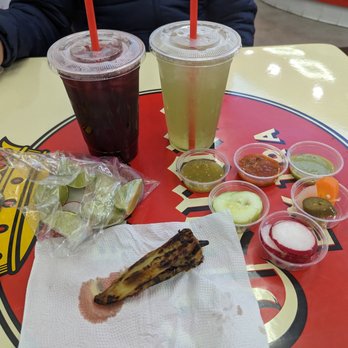 Tacos La Rueda - Agua de jamaica + agua de pepino con limón + salsas/toppings. - Tacos Near Me - Bellflower, California Tacos La Rueda - Agua de jamaica + agua de pepino con limón + salsas/toppings. - Tacos Near Me - Bellflower, California