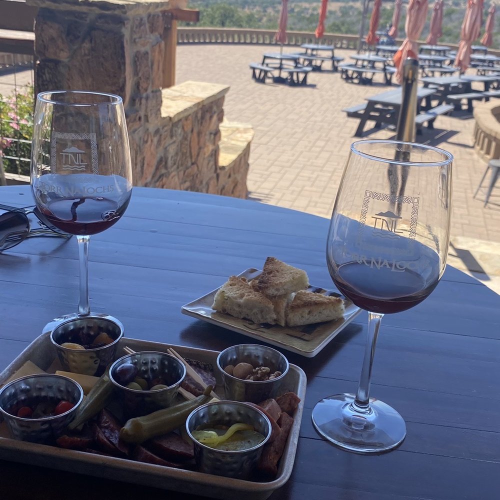 Torr Na Lochs - Wine tasting and meat cheese platter on the deck. - Wineries Near Me - Burnet, Texas Torr Na Lochs - Wine tasting and meat cheese platter on the deck. - Wineries Near Me - Burnet, Texas