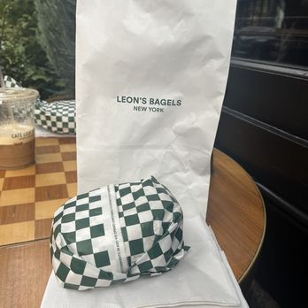 Leon's Bagels - Sesame bagel with scallion cream cheese, and sliced tomato - Bagels Near Me - New York, New York Leon's Bagels - Sesame bagel with scallion cream cheese, and sliced tomato - Bagels Near Me - New York, New York