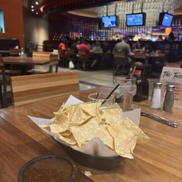 View of bar area from dining room with complimentary Chips and Salsa