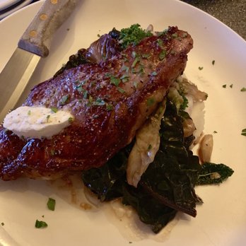 Red House - 12oz steak over greens and mashed potatoes - New American Near Me - Renton, Washington Red House - 12oz steak over greens and mashed potatoes - New American Near Me - Renton, Washington