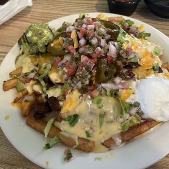 Los Agaves Mexican Grill & Bar - My Pops straight demolished these fries! The portion was huge, but he is a beast. - Mexican Near Me - Rice, Texas Los Agaves Mexican Grill & Bar - My Pops straight demolished these fries! The portion was huge, but he is a beast. - Mexican Near Me - Rice, Texas