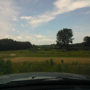Spillers' Farm Store -  view of a farm from inside a car - Farmers Market Near Me - Wells, Maine