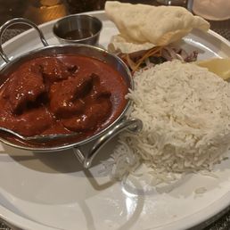 At the Whatf. Tikka chicken with rice. At the Whatf. Tikka chicken with rice.