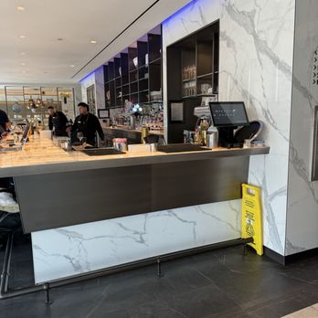 United Polaris Lounge - the counter and seating area - Airport Lounges Near Me - Houston, Texas