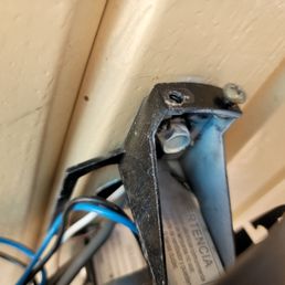 I see no box installed per NEC 314.27(C) Boxes at Ceiling-Suspended (Paddle) Fan Outlets.