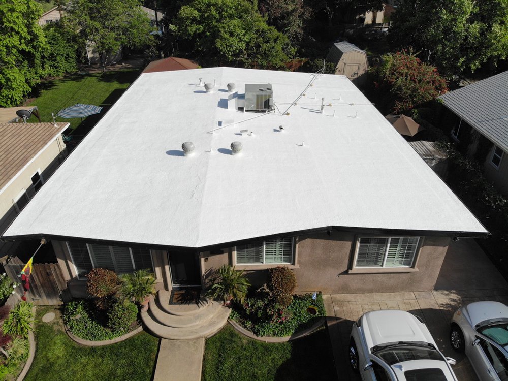 Slide of Flat Roof Pros