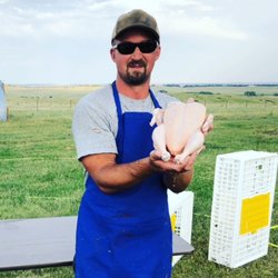 Rocky Mountain Pastures - Brian with a delicious pasture raised chicken
