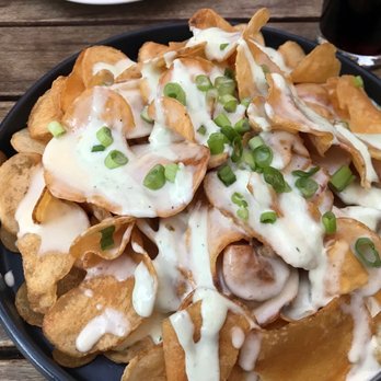 Nine Fine Irishmen - Irish nachos. Potato slices with beer cheese and chives. Enough to feed an army. Loved it. - Venues & Event Spaces Near Me - Las Vegas, Nevada Nine Fine Irishmen - Irish nachos. Potato slices with beer cheese and chives. Enough to feed an army. Loved it. - Venues & Event Spaces Near Me - Las Vegas, Nevada