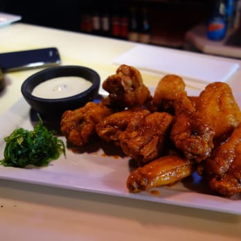 Engine No 9 - Sriracha Crusted Hot Wings - 10 Jumbo Wings marinated then golden fried and tossed with Sriracha and Voodoo Hot Sauce - Burgers Near Me - Saint Petersburg, Florida