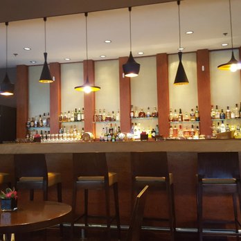 Gio Restaurant - a bar with a lot of chairs - Canadian (New) Near Me - Halifax, Nova Scotia