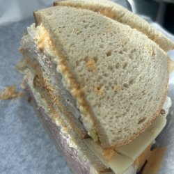 Avenue Deli - Dagwood sandwich (Turkey, ham, Swiss cheese, joeslaw, and Russian dressing made on three tiers of rye)