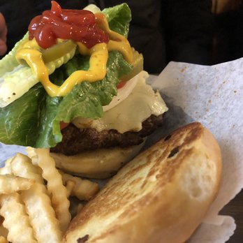 Round-A-Bout Bar & Grill - ows a hamburger and fries - American Near Me - Webster, Wisconsin