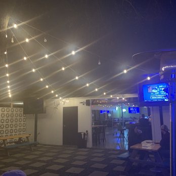 Lazy Oaks Beer Garden - String lights lead indoors... nice touch! - Bars Near Me - Houston, Texas Lazy Oaks Beer Garden - String lights lead indoors... nice touch! - Bars Near Me - Houston, Texas