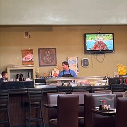 Man making sushi.