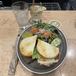 Club sandwich, side salad, tequila soda