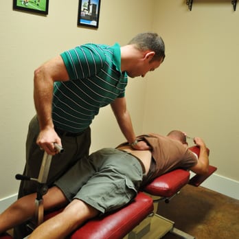 Buda Health Center - Using flexion distraction to alleviate low back pain. - Chiropractors Near Me - Buda, Texas