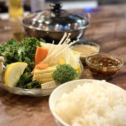 Tadaima Shabu Shabu - Dipping sauces (Goma or Ponzu), steamed rice, and veggies.