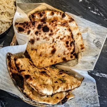 Haveli Indian Cuisine - Peshwari Naan and Garlic Naan at Haveli Indian Cuisine - Indian Near Me - Arlington, Massachusetts Haveli Indian Cuisine - Peshwari Naan and Garlic Naan at Haveli Indian Cuisine - Indian Near Me - Arlington, Massachusetts