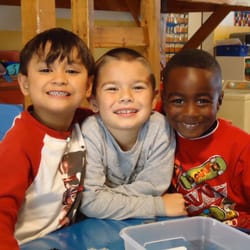 New Horizons A Montessori School - Friends taking a moment from their play time.