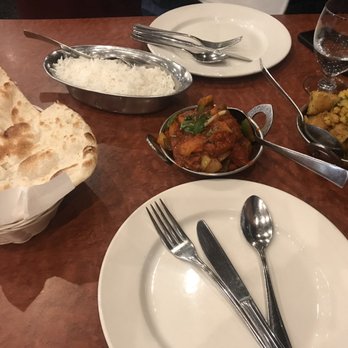 Indian Oven - We got an order of nan, basmati rice, Aloo Gobi, and Bhuna Gosht. - Indian Near Me - Vancouver, British Columbia Indian Oven - We got an order of nan, basmati rice, Aloo Gobi, and Bhuna Gosht. - Indian Near Me - Vancouver, British Columbia
