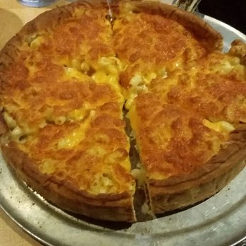 Moretti's Ristorante and Pizzeria - Macaroni & cheese deep dish. It was a 10", but after the free bread starter, I could only eat 2 slices. So feeds 2-3. Not bad, needed bacon - Italian Near Me - Chicago, Illinois
