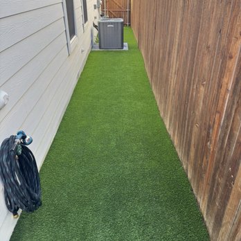 Texas Turf Pros - Side Yard was originally filled with rocks, but know Texas turf pros made it look fantastic! - Artificial Turf Near Me
